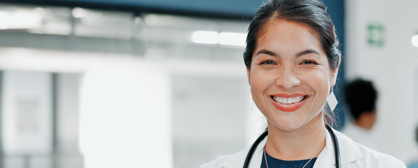 Female clinician with stethoscope and clipboard